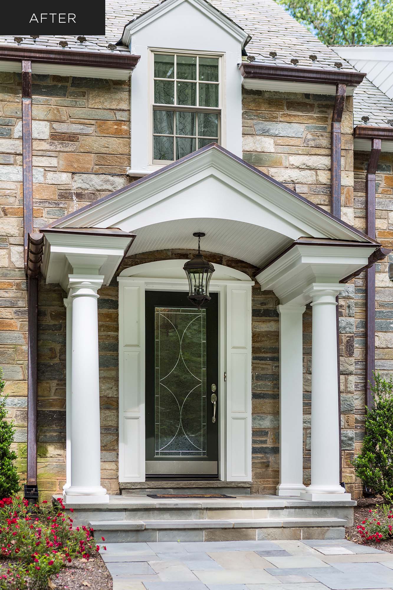 Elegant home portico with columns and leaded-glass door