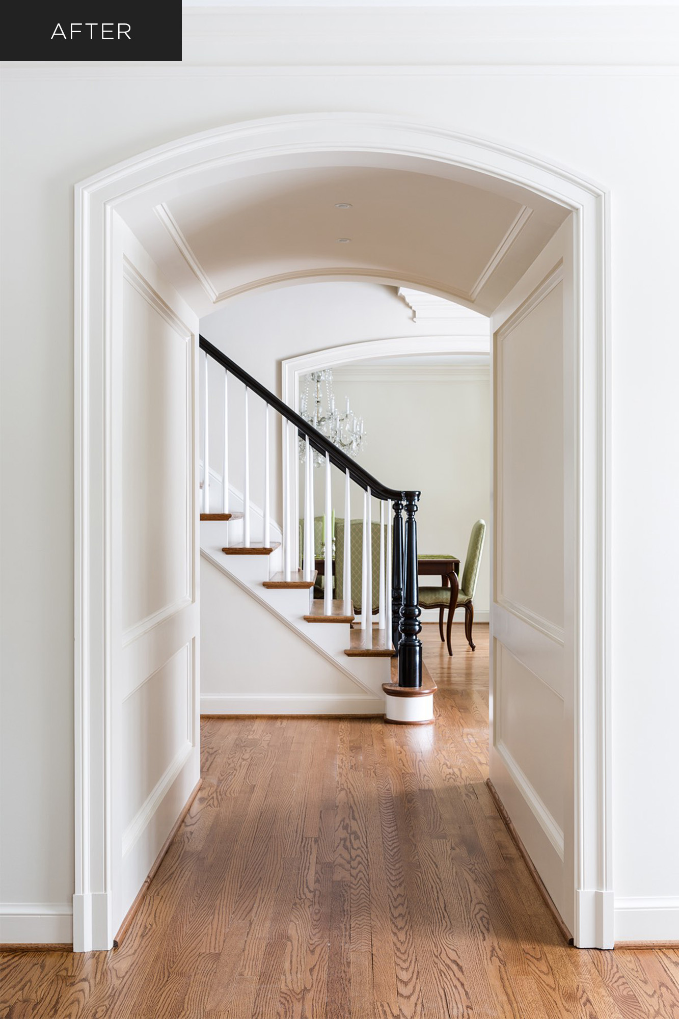 Home with curved archway hall and milled newel post on stairs
