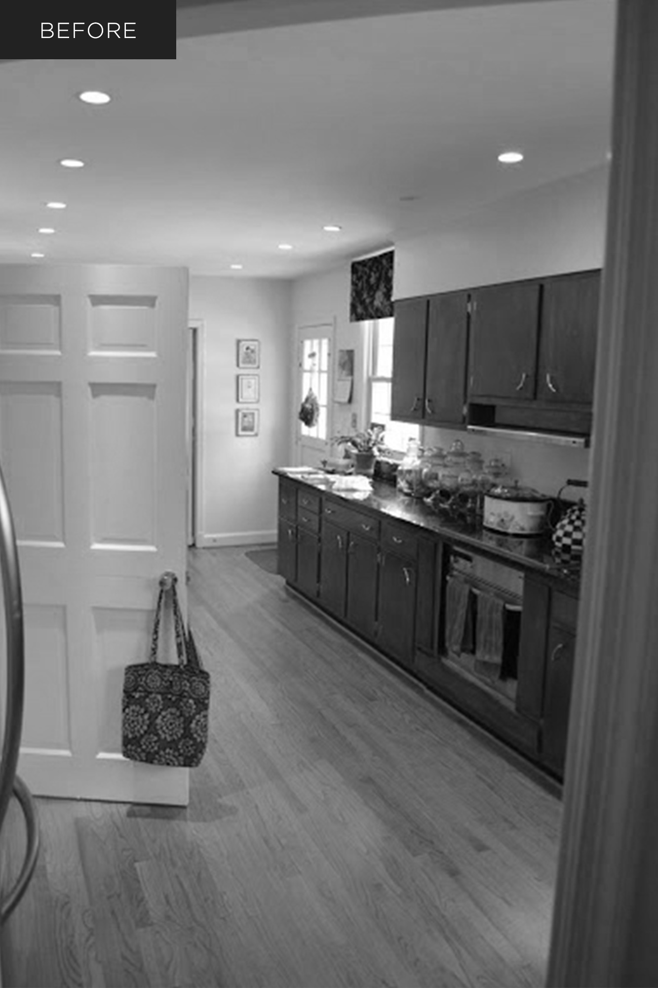 Kitchen before renovation, dark wood cabinetry, crowded galley layout