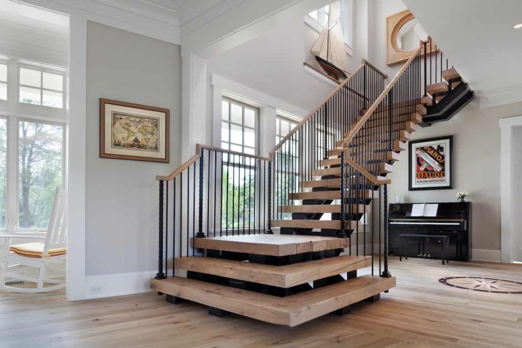 floating staircase remodel in custom home
