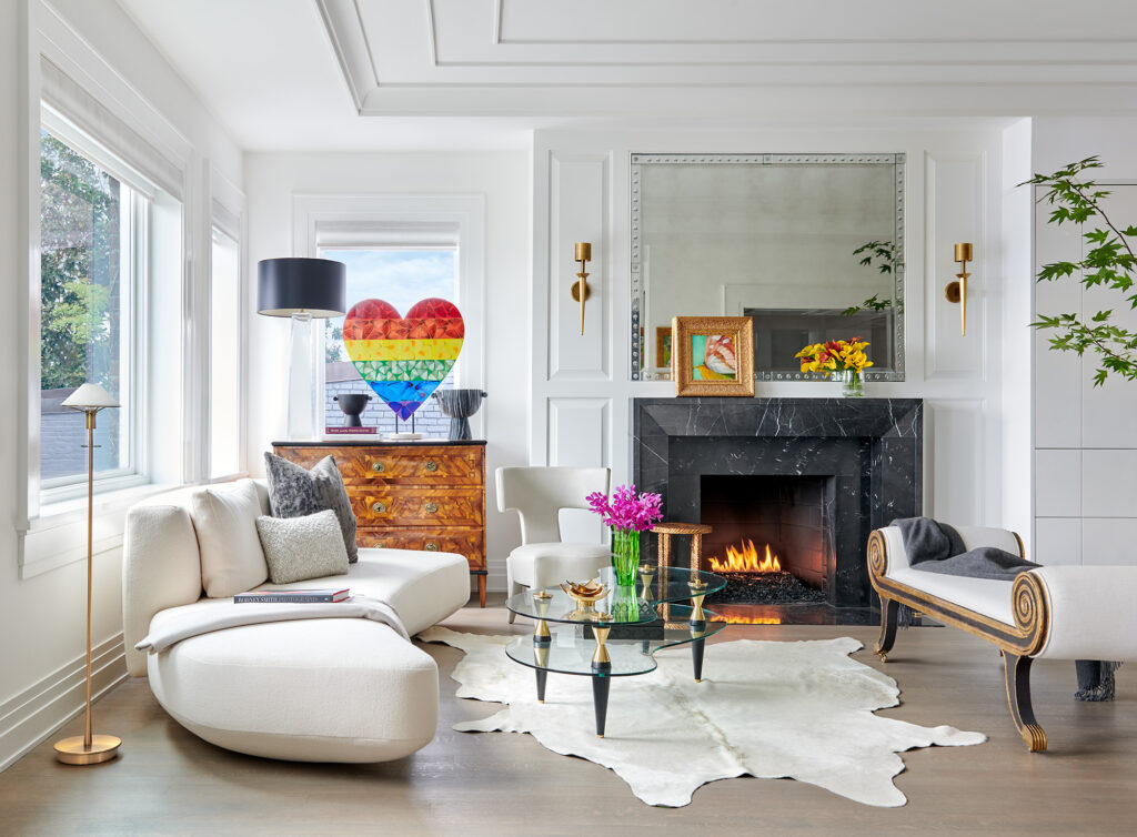 DC penthouse condo living room with marble fireplace and art