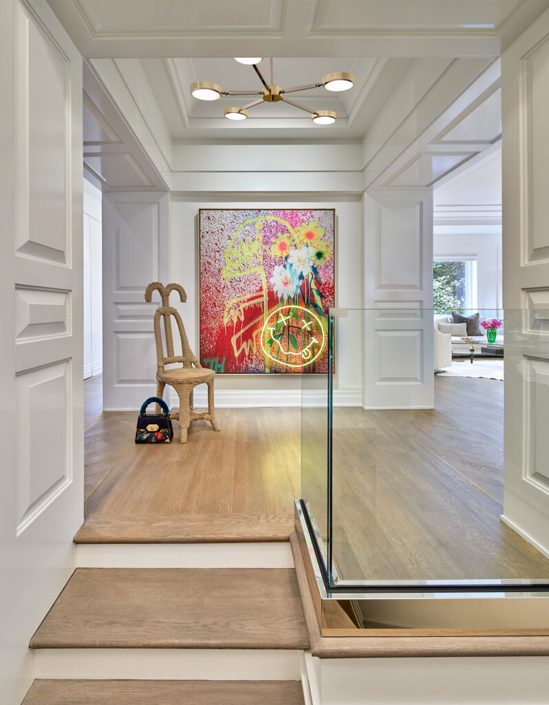 georgetown penthouse entry/foyer with glass rail and neon art
